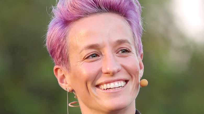 Megan Rapinoe smiling pink hair