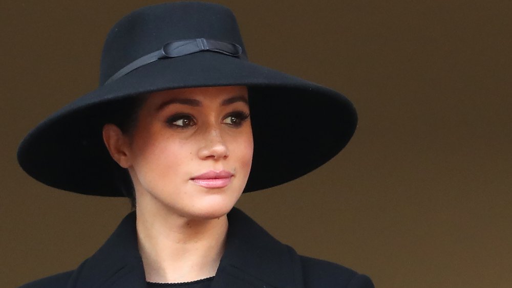 Meghan Markle in a large black hat