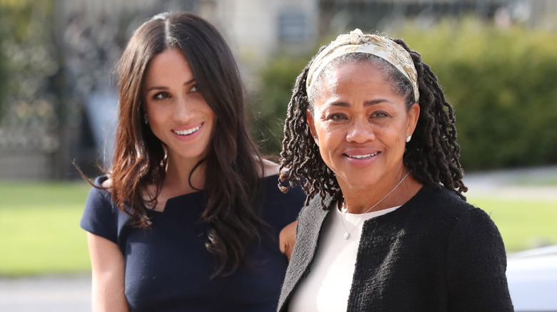 Meghan Markle and Doria Ragland smiling 