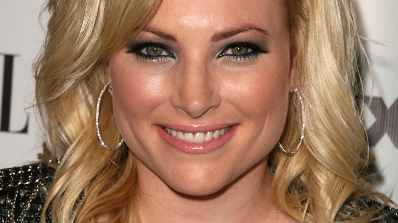 Meghan McCain smiles on the red carpet