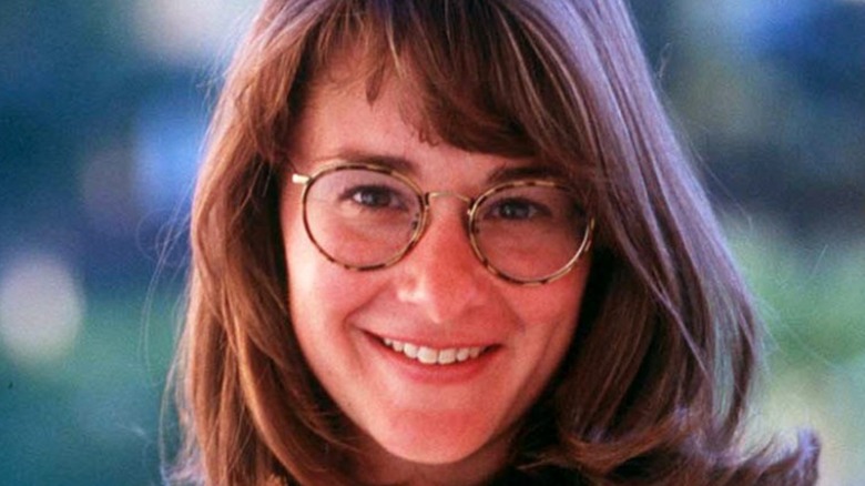 A young Melinda Gates smiling 