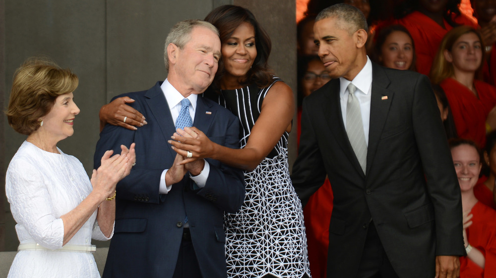 Michelle hugs George Bush