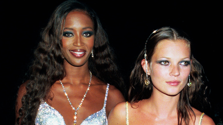 Naomi Campbell and Kate Moss posing