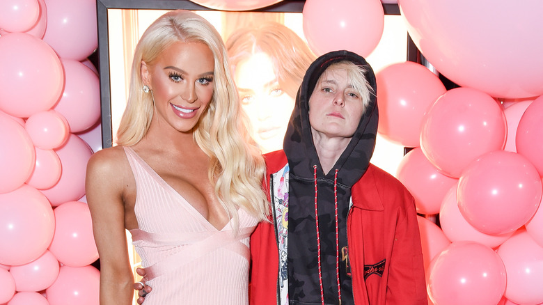 Gigi Gorgeous and Nats Getty both posing