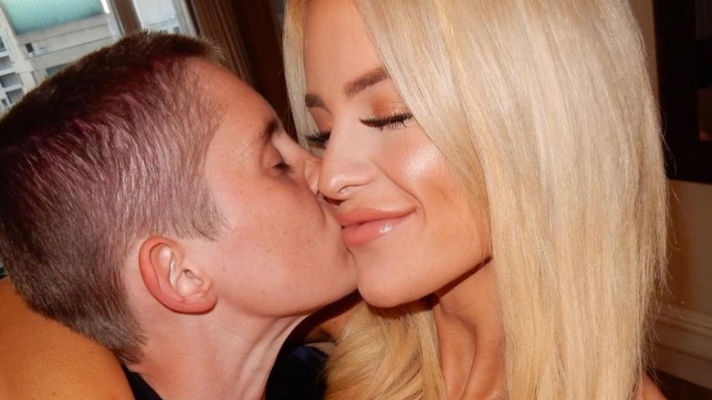 Gigi Gorgeous and Nats Getty kissing
