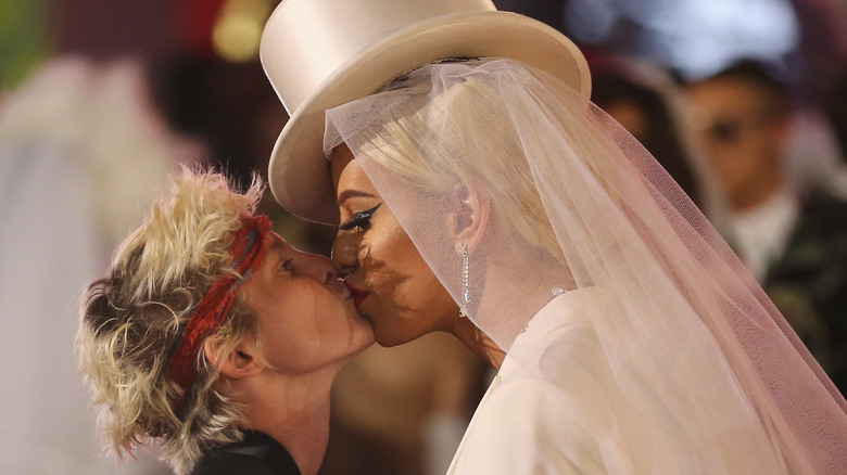 Nats Getty and Gigi Gorgeous kissing