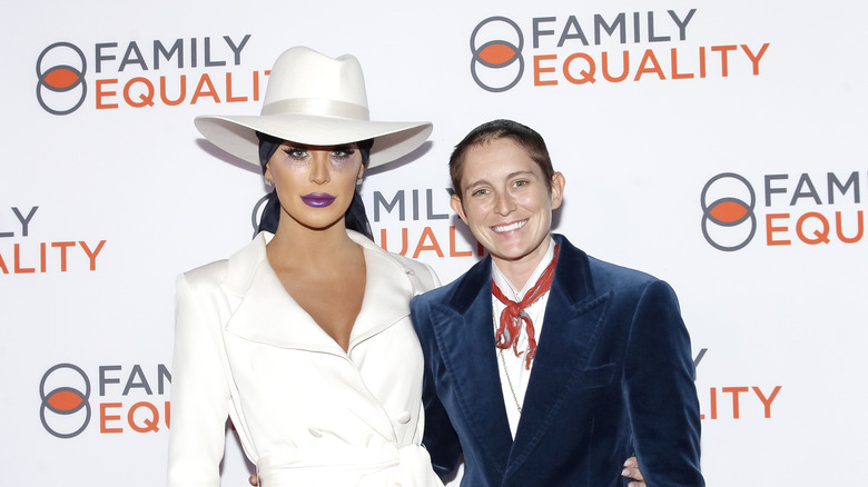 Gigi Gorgeous and Nats Getty both posing together