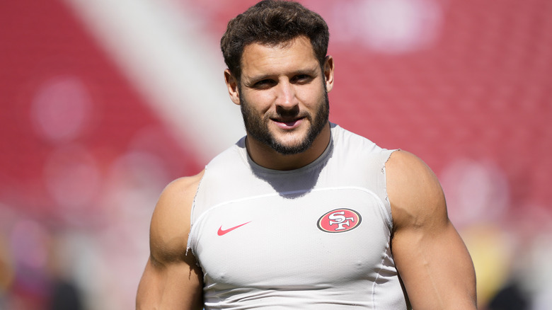 Nick Bosa smiling on football field