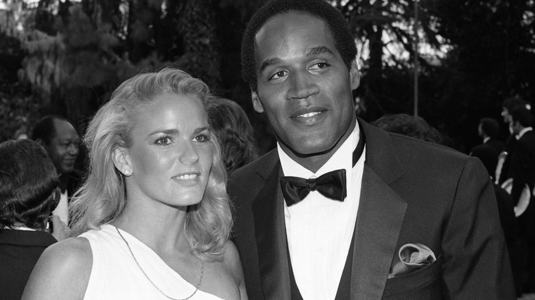 Nicole Brown Simpson and O.J. Simpson smiling
