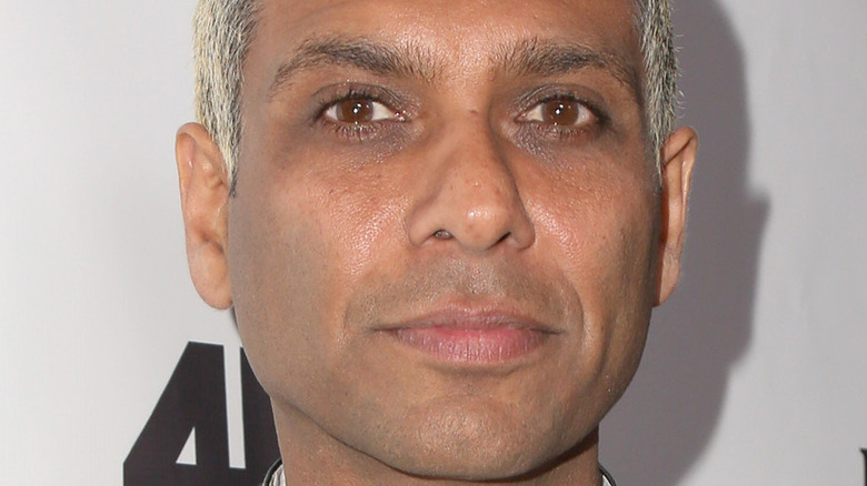 Tony Kanal looks solemn on a red carpet 