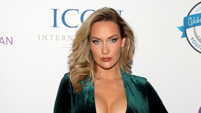 Paige Spiranac green velvet dress