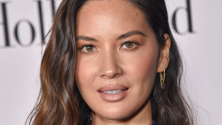 Olivia Munn looking into camera