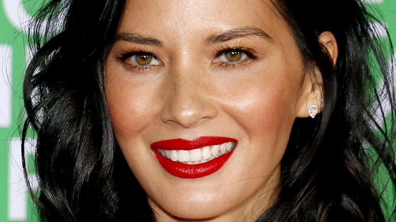 Olivia Munn wearing red lipstick