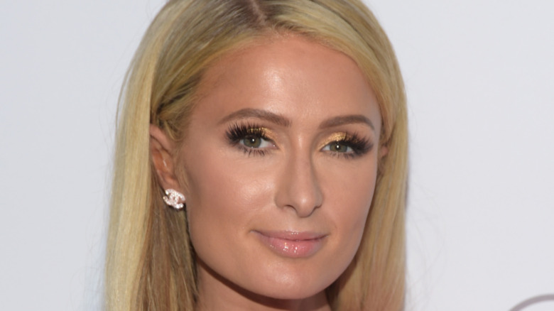 Paris Hilton looking at camera