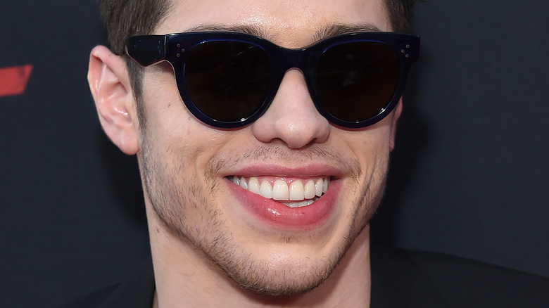 Pete Davidson smiling with sunglasses