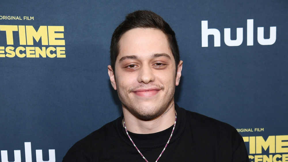 Pete Davidson posing at a red carpet event