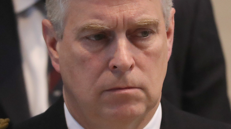 Prince Andrew frowning