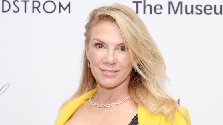 Ramona Singer wearing a yellow jacket