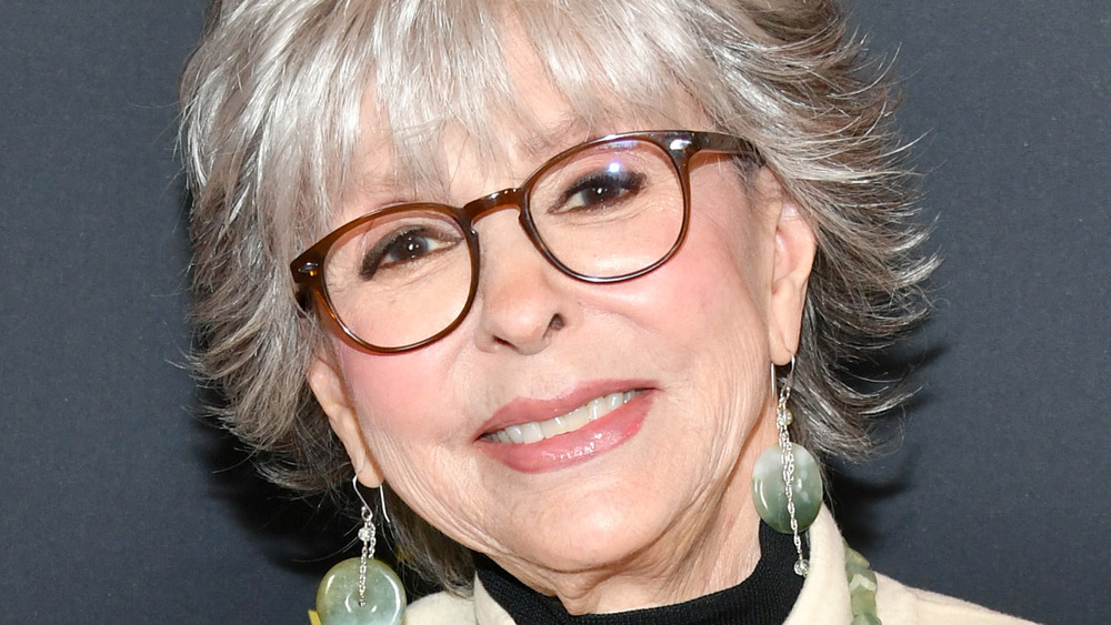 Rita Moreno posing in glasses