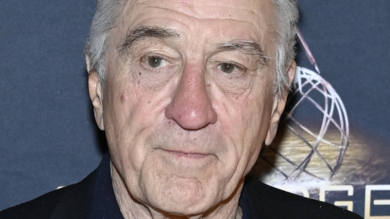 Robert De Niro smirking