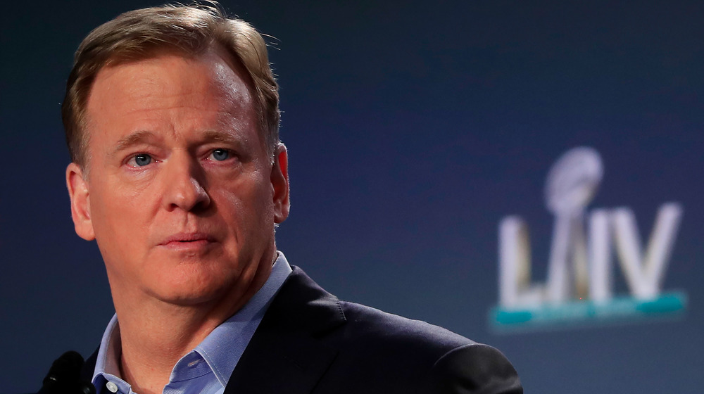 Roger Goodell looking serious at a press conference