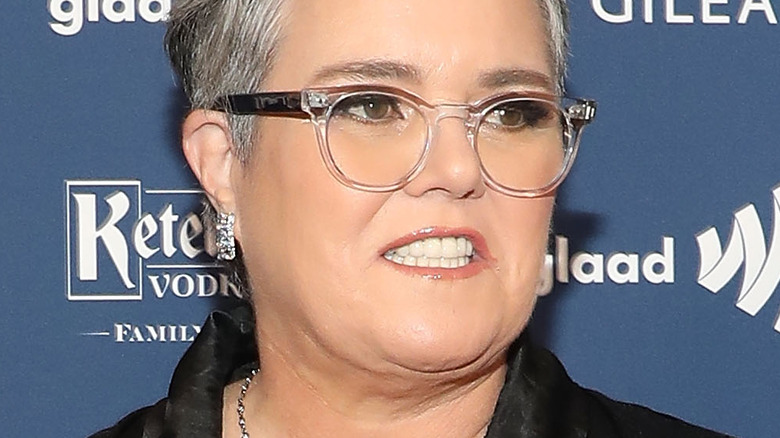 Rosie O'Donnell with glasses and serious expression red carpet