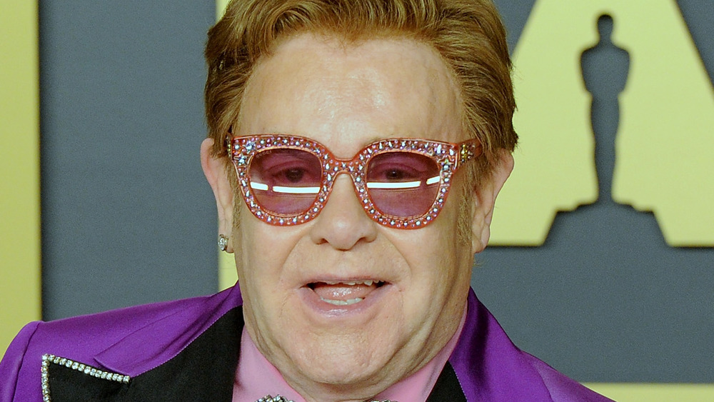 Elton John in bedazzled glasses