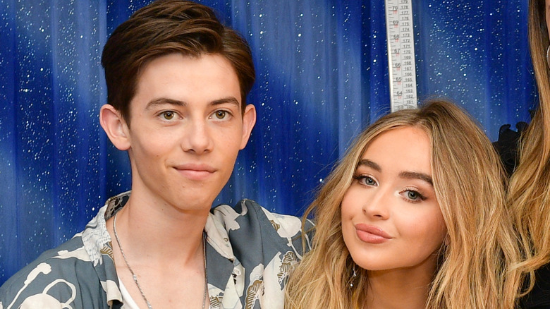 Sabrina Carpenter and Griffin Gluck smiling