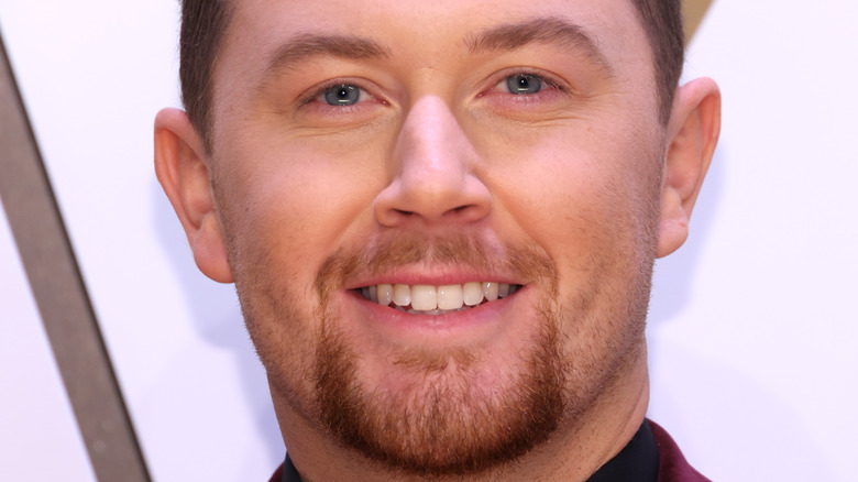Scotty McCreery smiling at an event