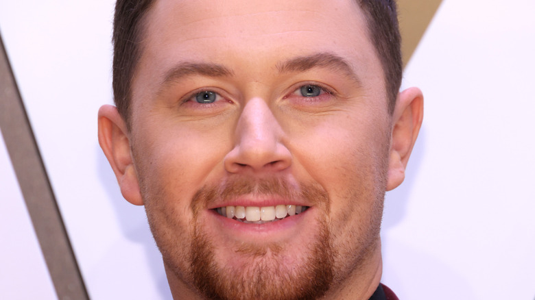 Scotty McCreery smiling at an event