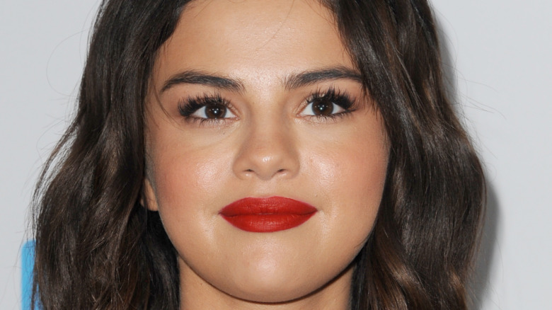 Selena Gomez wears red lipstick