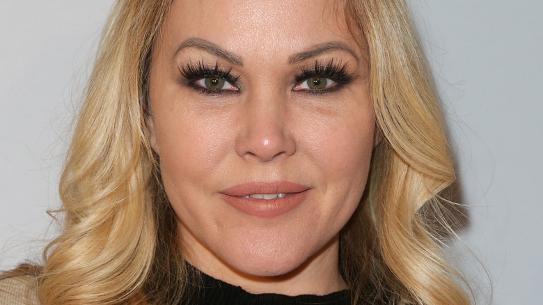 Shanna Moakler, smirking