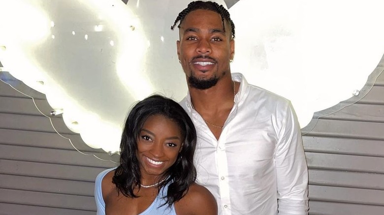 Simone Biles and Jonathan Owens smiling