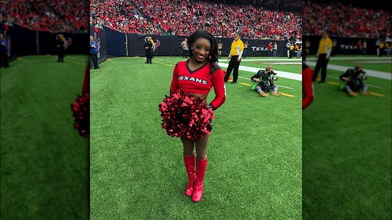 Simone Biles dressed as a Houston Texans cheerleader