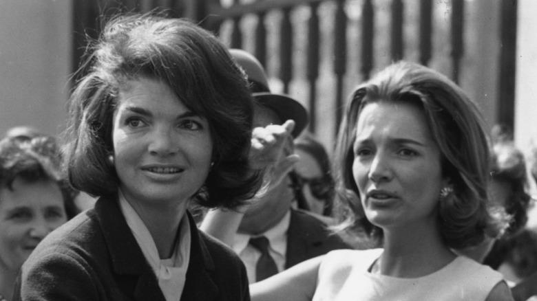 Jackie Kennedy and Caroline 'Lee' Radziwill together in a crowd
