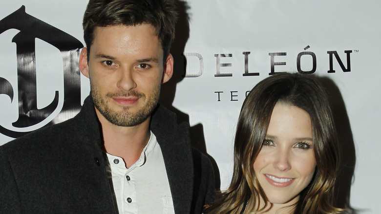 Sophia Bush and Austin Nichols smiling