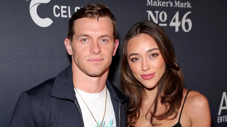 Braxton Berrios and Sophia Culpo pose at a 2022 event