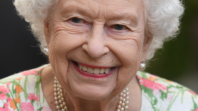 Queen Elizabeth smiles