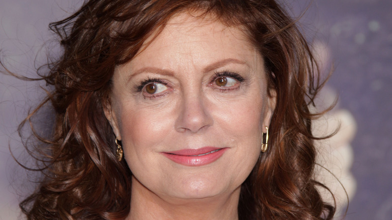 Susan Sarandon poses in gold earrings
