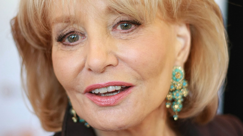 Barbara Walters wearing blue earrings