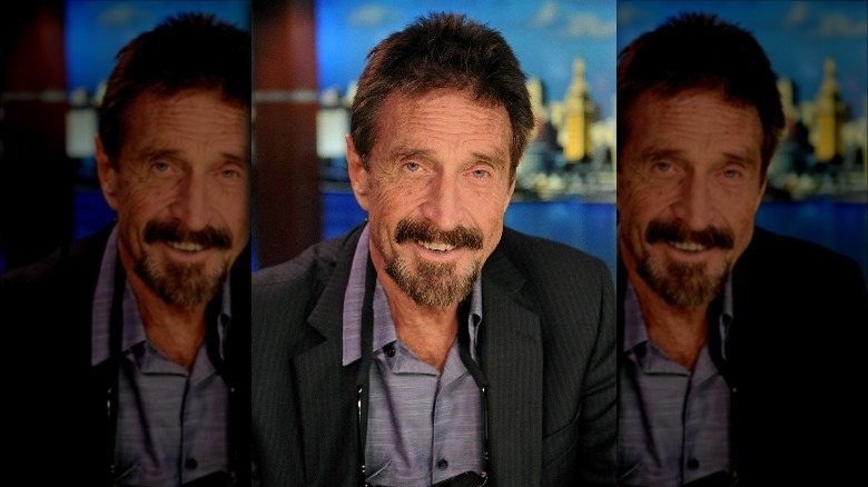 John McAfee smiling