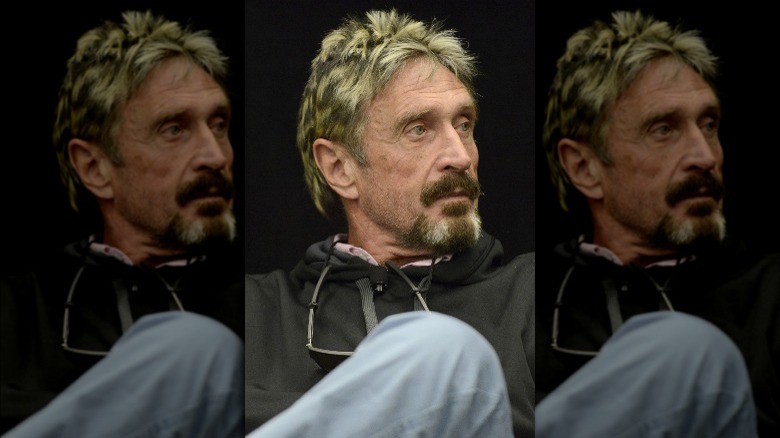 John McAfee looking upset