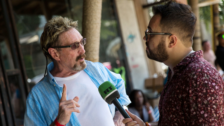 John McAfee responding to reporter