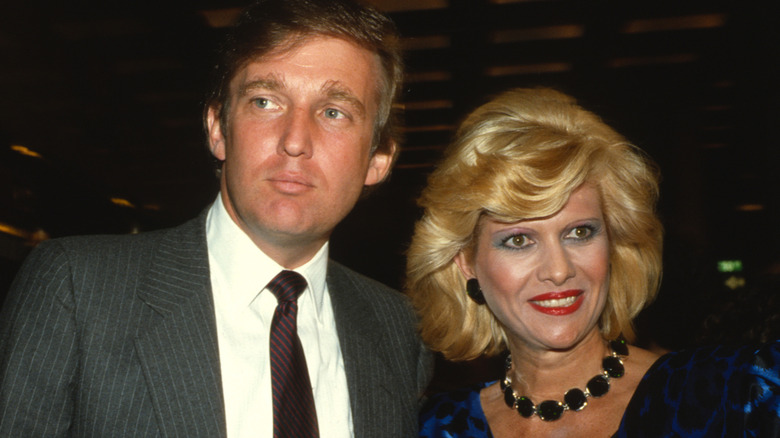 Donald Trump looks on, Ivana Trump smiles tensely