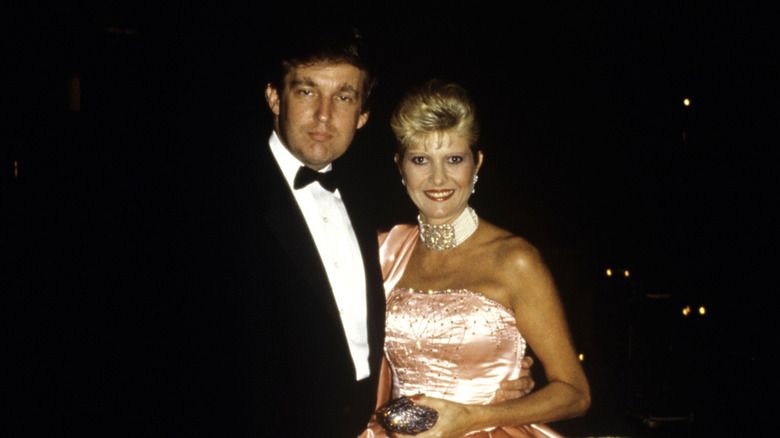 Donald Trump stares, Ivana smiles in formalwear