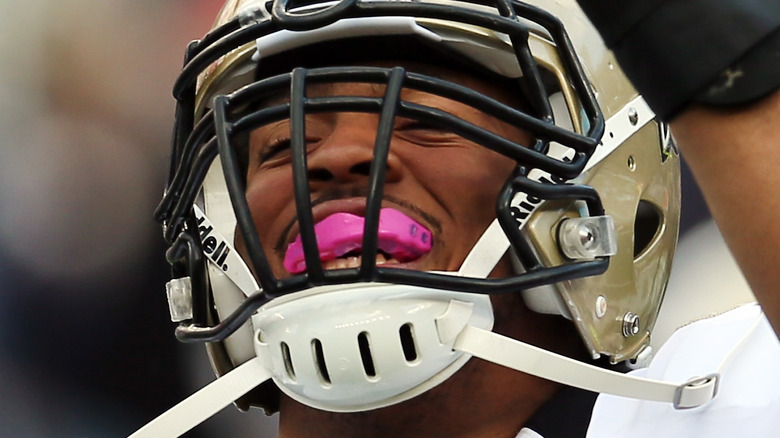 Glenn Foster Jr. playing football