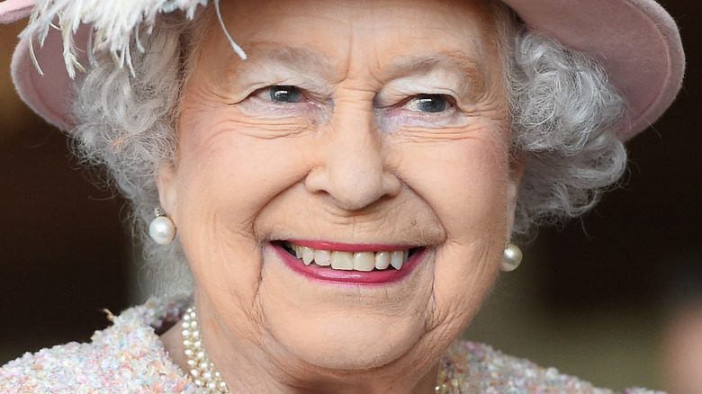 Queen Elizabeth smiling in hate