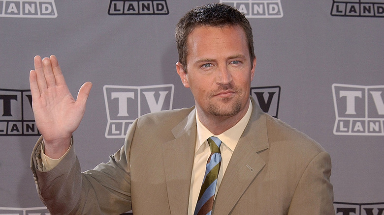 Matthew Perry waving