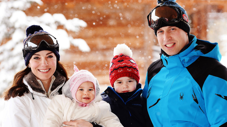 The Wales family outside in the snow