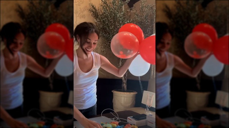 Meghan Markle making birthday decorations
